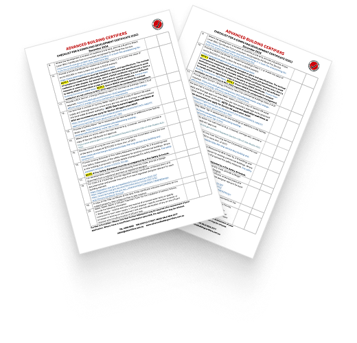 A red marker ticking a construction compliance checklist during a building site inspection
