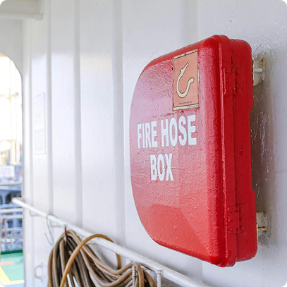 Fire hose box equipment for safety compliance.